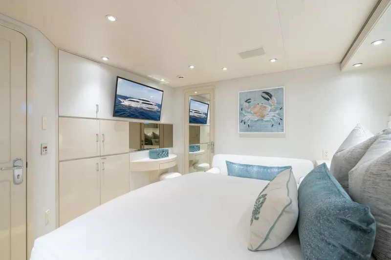 Slide: The Image of Luxurious 2001 Westship Skylounge yacht bedroom with modern decor and elegant furnishings. - 34