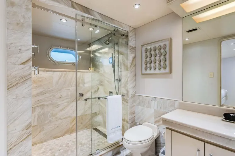 Slide: The Image of Luxurious bathroom in 2001 Westship Skylounge yacht with marble shower and elegant fixtures. - 35