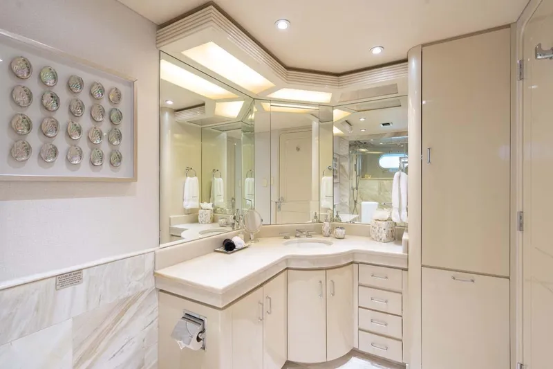 Slide: The Image of Luxurious bathroom in 2001 Westship Skylounge yacht with elegant fixtures and mirrored walls. - 36