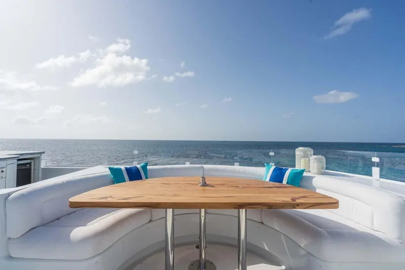 Slide: The Image of Luxurious 2001 Westship Skylounge yacht deck with ocean view and elegant seating. - 52