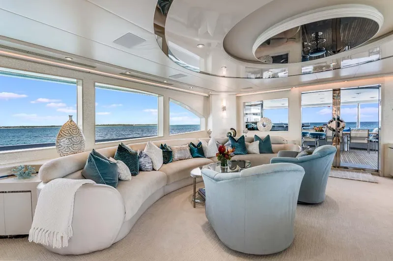 Slide: The Image of Luxurious 2001 Westship Skylounge interior with elegant seating and ocean views. - 9