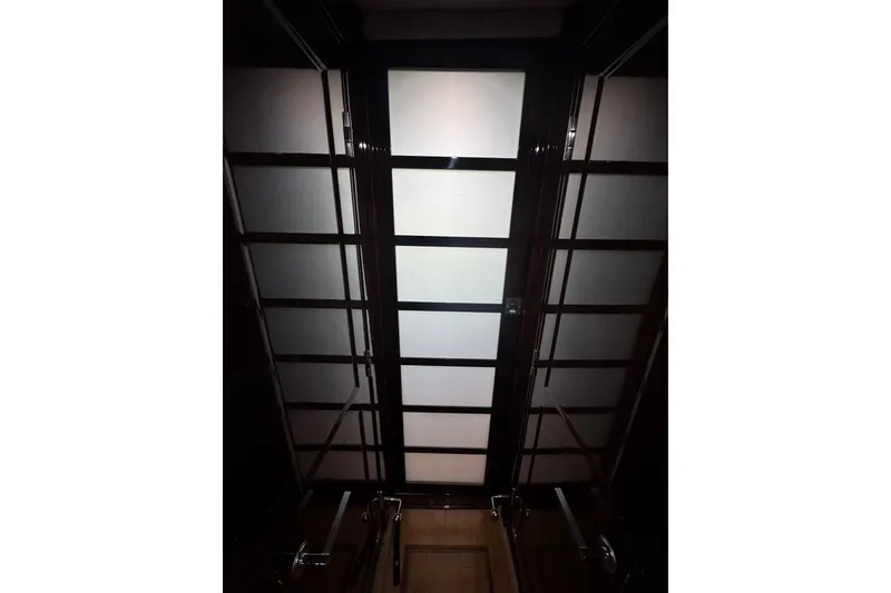 Slide: The Image of Ceiling view inside 2009 Sea Ray 470 Sundancer yacht, featuring modern design elements. - 33