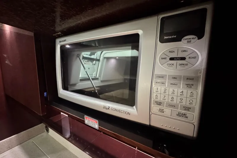 Slide: The Image of Sharp microwave in 2009 Sea Ray 470 Sundancer yacht kitchen. - 36