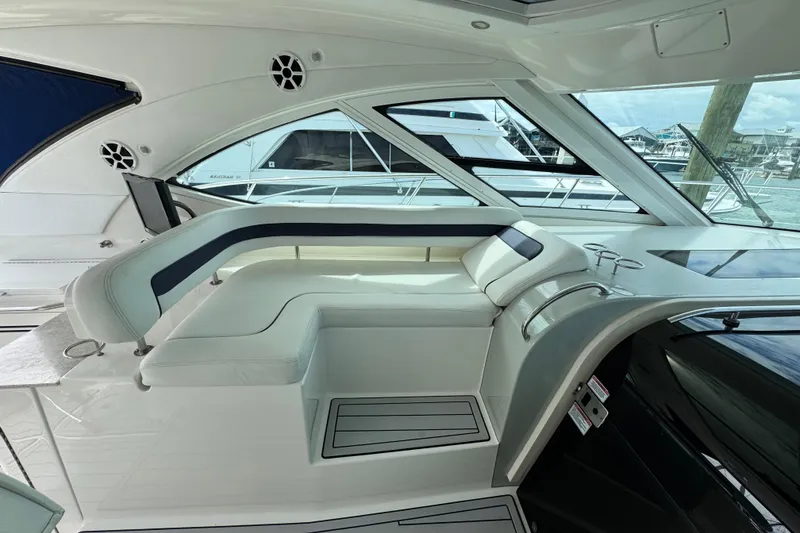 Slide: The Image of Luxurious interior of 2009 Sea Ray 470 Sundancer yacht with elegant seating and windows. - 59