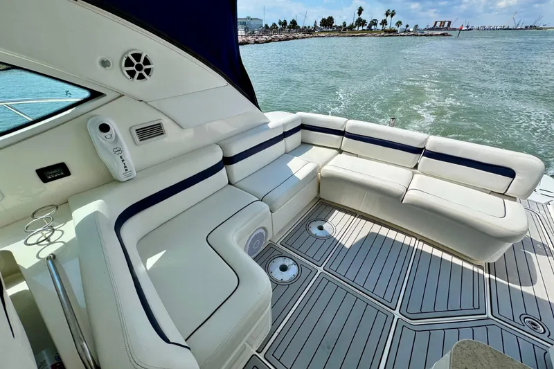 Slide: The Image of Luxurious seating area on a 2009 Sea Ray 470 Sundancer yacht, overlooking the ocean. - 7