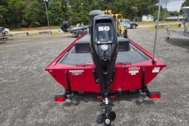 Slide: The Image of 2023 Tracker Pro 170 boat with Mercury 50 engine, parked outdoors. - 4