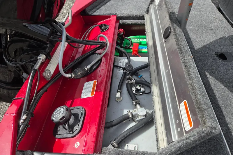 Slide: The Image of Open engine compartment of 2023 Tracker Pro 170 boat showing wiring and battery. - 8