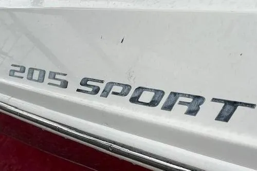 Slide: The Image of 2008 Sea Ray 205 Sport boat model name on hull. - 10