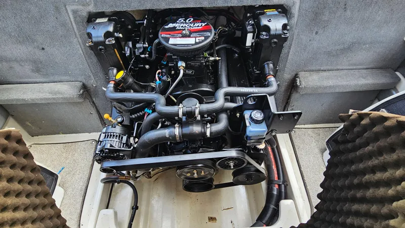 Slide: The Image of 2008 Sea Ray 205 Sport boat engine compartment with 5.0L MerCruiser engine. - 23
