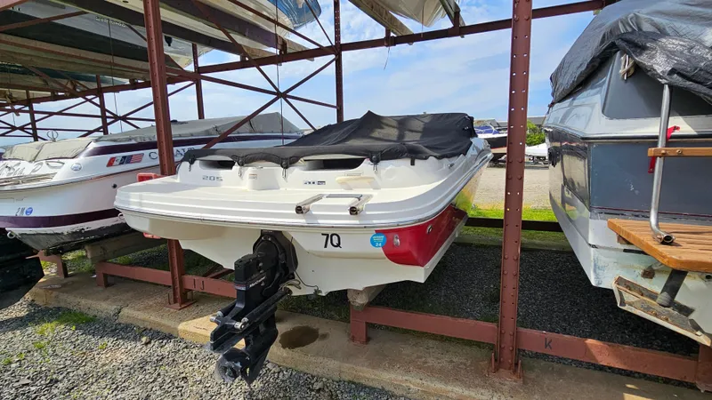 Slide: The Image of 2008 Sea Ray 205 Sport boat in storage, rear view. - 7