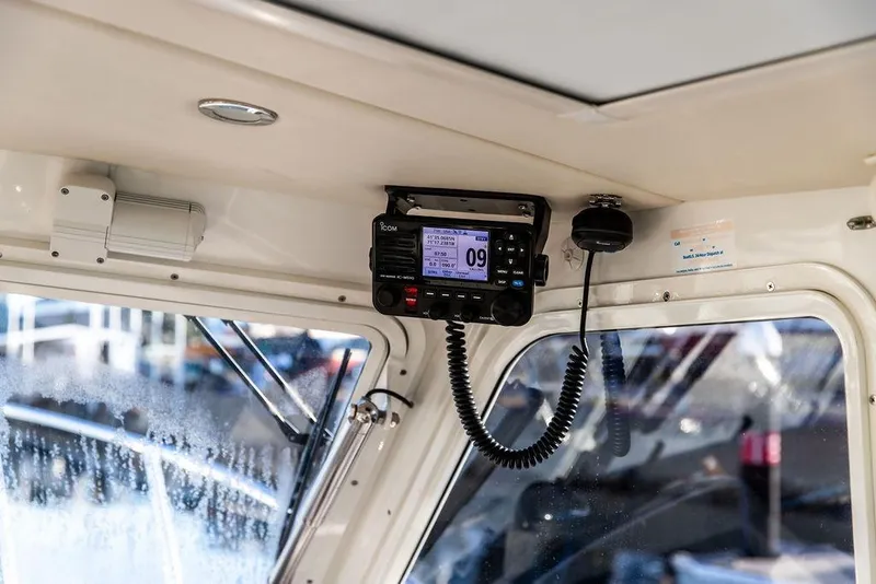 Slide: The Image of Interior of 2018 MJM 43z boat with mounted marine radio system. - 26