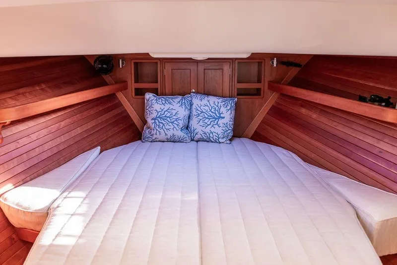 Slide: The Image of Luxurious cabin interior of 2018 MJM 43z yacht with cozy bedding and wooden finish. - 38