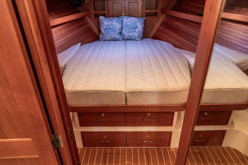 Slide: The Image of Luxurious cabin interior of 2018 MJM 43z yacht with wooden finish and cozy bedding. - 39