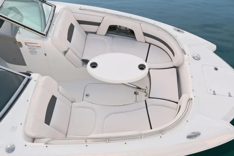 Slide: The Image of Manufacturer Provided Image: 2016 Chaparral 264 Sunesta boat with spacious seating and table in bow area. - 3