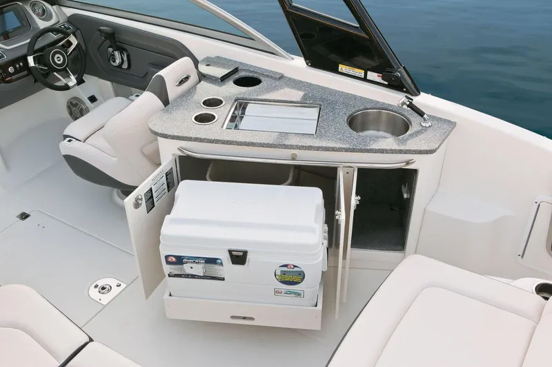 Slide: The Image of Manufacturer Provided Image: 2016 Chaparral 264 Sunesta boat interior with kitchenette and cooler. - 6
