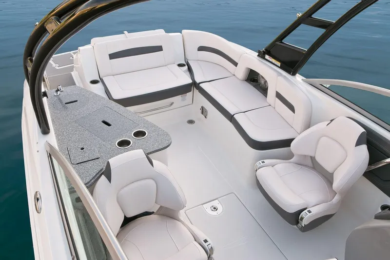 Slide: The Image of Manufacturer Provided Image: 2016 Chaparral 264 Sunesta boat interior with white and gray seating. - 7