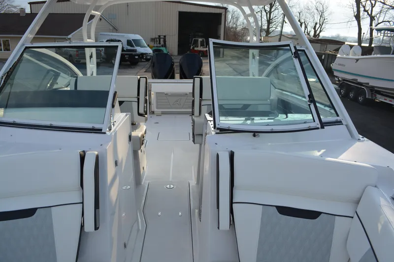Slide: The Image of 2026 Blackfin 272 DC boat interior with open windshield and seating area. - 15