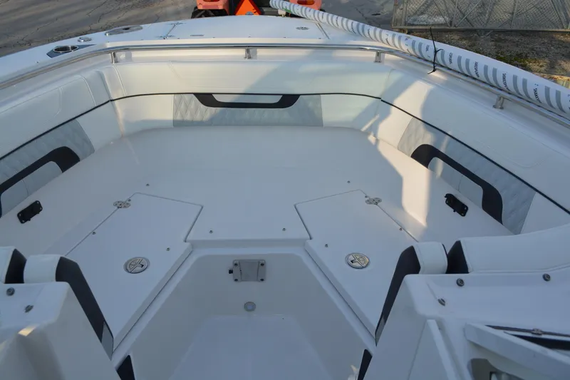 Slide: The Image of 2026 Blackfin 272 DC boat interior with spacious seating and modern design. - 16