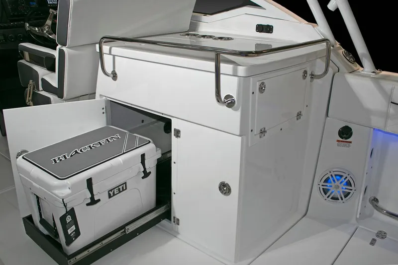 Slide: The Image of Manufacturer Provided Image: 2026 Blackfin 272 DC boat interior with Yeti cooler storage. - 7