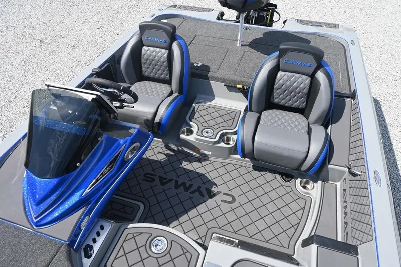 Slide: The Image of 2026 Caymas CX21 boat interior with dual seats and sleek blue accents. - 10