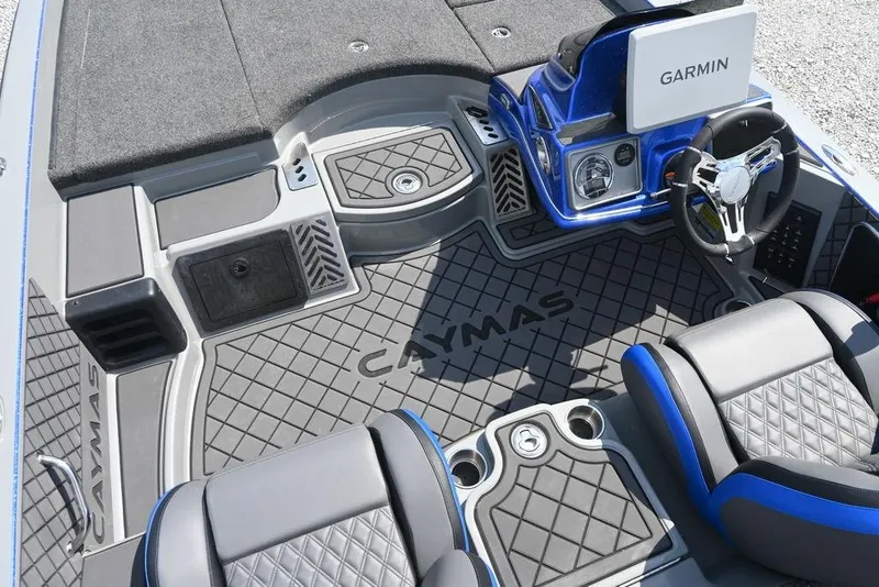 Slide: The Image of 2026 Caymas CX21 boat interior with Garmin system and stylish seating. - 5