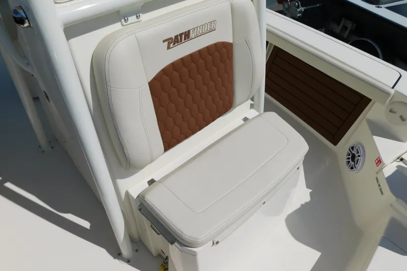 Slide: The Image of 2026 Pathfinder 2400 TRS boat seat with brown and white upholstery. - 14