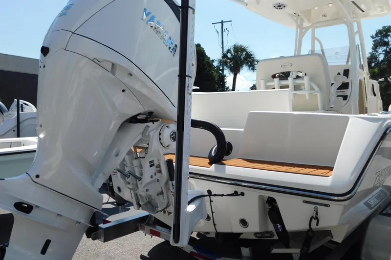 Slide: The Image of 2026 Pathfinder 2400 TRS boat with Yamaha outboard motor, rear view. - 18