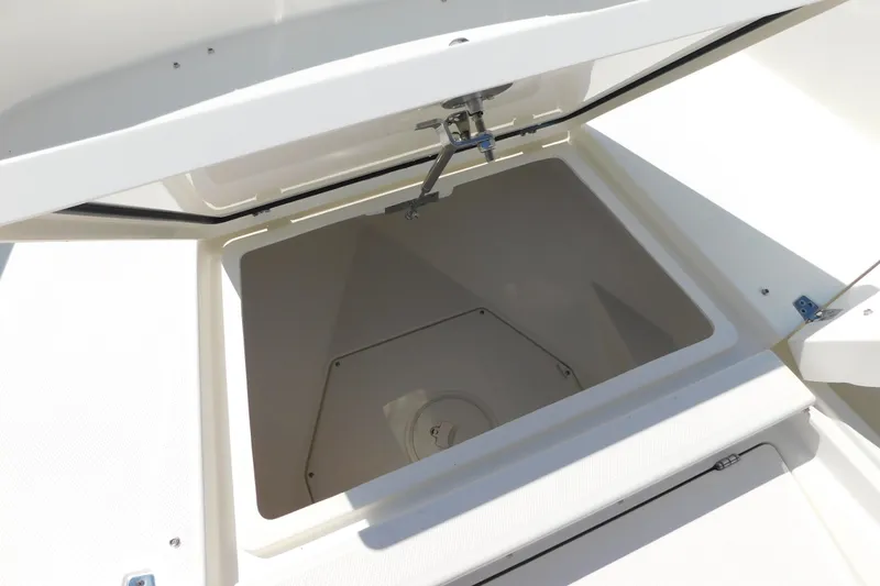 Slide: The Image of Open storage compartment on 2026 Pathfinder 2400 TRS boat, showcasing interior space. - 30