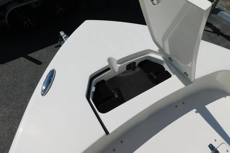 Slide: The Image of Open storage compartment on 2026 Pathfinder 2400 TRS boat deck. - 33