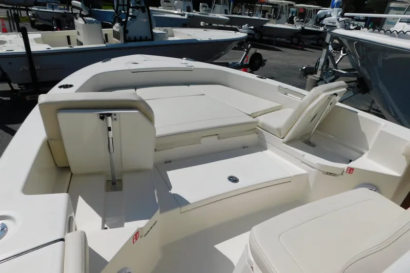 Slide: The Image of 2026 Pathfinder 2400 TRS boat interior with seating and storage features. - 4