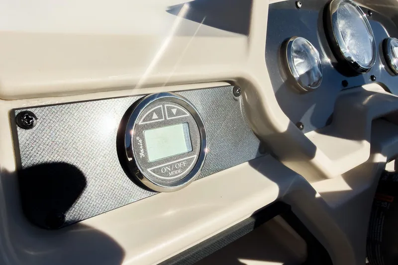 Slide: The Image of Close-up of 2026 Godfrey Sweetwater Xperience 22' dashboard with control panel and gauges. - 18
