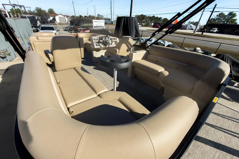 Slide: The Image of 2026 Godfrey Sweetwater Xperience 22' Tritoon with spacious split bench seating. - 24