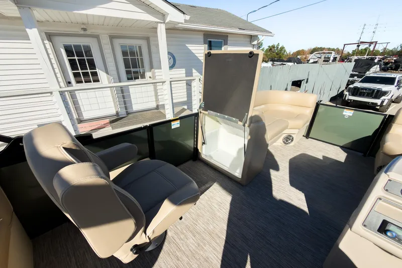 Slide: The Image of 2026 Godfrey Sweetwater Xperience 22' Tritoon interior with seating and storage. - 28