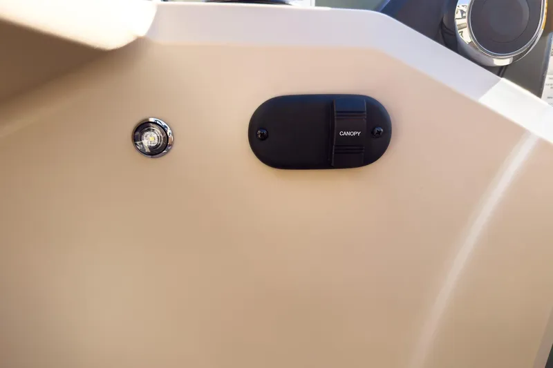 Slide: The Image of Control panel of 2026 Godfrey Sweetwater Xperience 22' Tritoon, featuring canopy switch. - 31