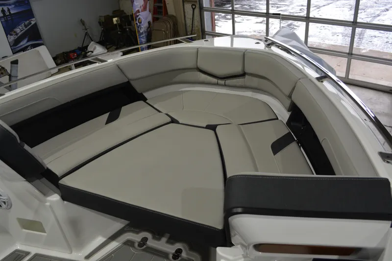 Slide: The Image of 2026 Monterey Elite 27 SD boat interior with spacious seating and modern design. - 15
