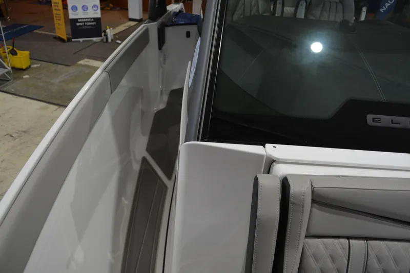 Slide: The Image of 2026 Monterey Elite 27 SD boat interior with sleek design and comfortable seating. - 17