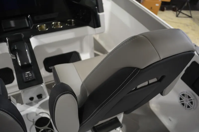 Slide: The Image of 2026 Monterey Elite 27 SD boat interior with sleek seating and modern dashboard design. - 20