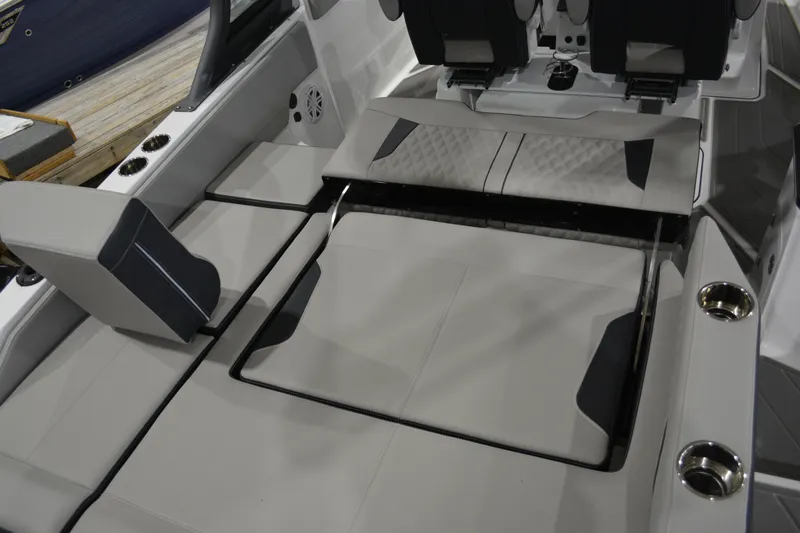 Slide: The Image of 2026 Monterey Elite 27 SD boat interior with luxurious seating and modern design. - 25