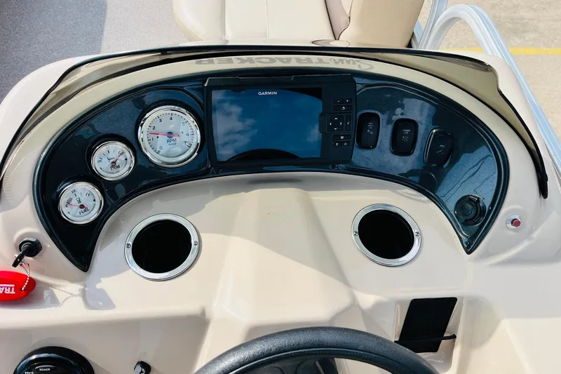 Slide: The Image of Dashboard of 2019 Sun Tracker Party Barge 18 DLX with gauges and Garmin display. - 28