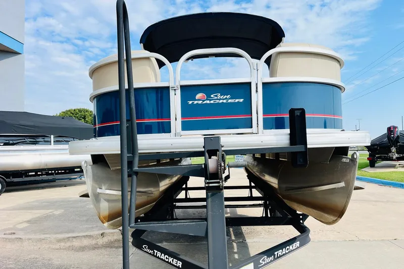 Slide: The Image of 2019 Sun Tracker Party Barge 18 DLX pontoon boat on trailer, outdoor display. - 3