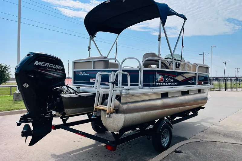 Slide: The Image of 2019 Sun Tracker Party Barge 18 DLX pontoon boat with Mercury outboard motor. - 6