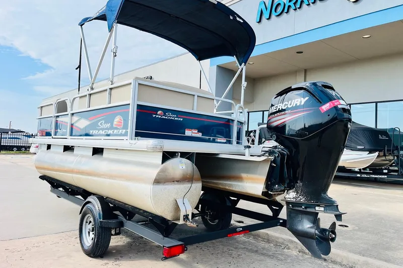 Slide: The Image of 2019 Sun Tracker Party Barge 18 DLX pontoon boat with Mercury outboard motor. - 8