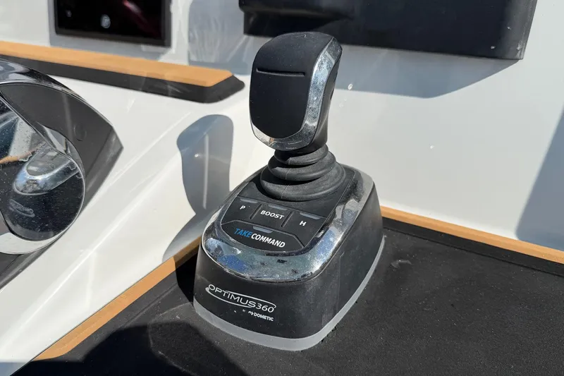 Slide: The Image of Joystick control on 2023 Costa Custom Boats 264 HC, featuring Optimus 360 by Dometic. - 18