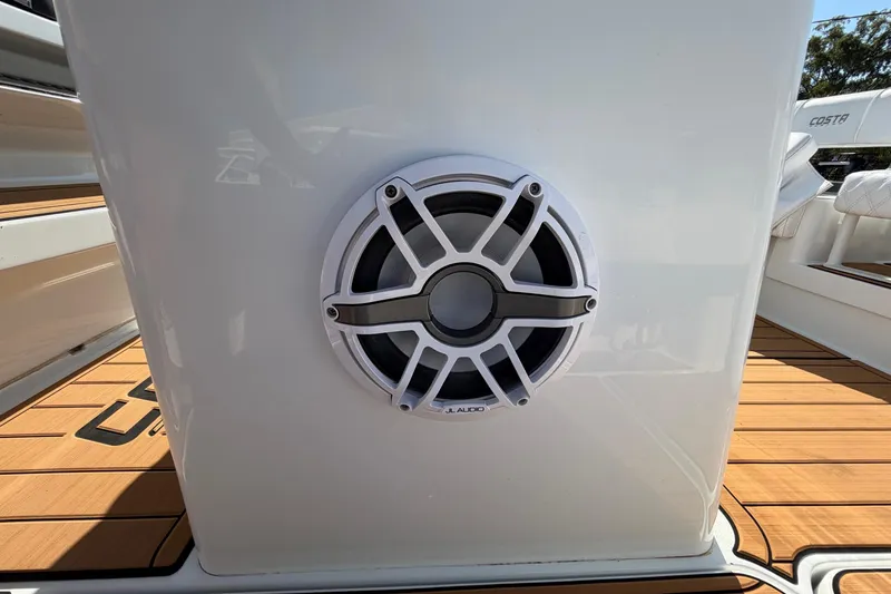 Slide: The Image of 2023 Costa Custom Boats 264 HC with JL Audio speaker on deck. - 52