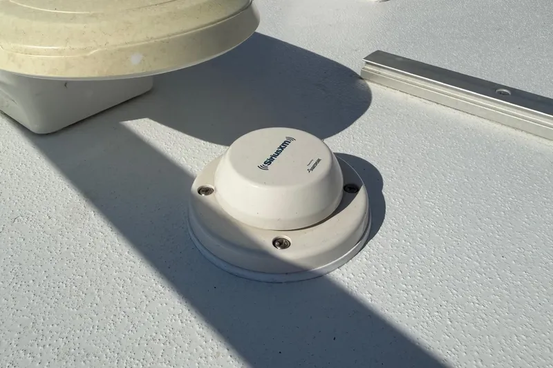 Slide: The Image of 2023 Costa Custom Boats 264 HC deck with SiriusXM antenna detail. - 54