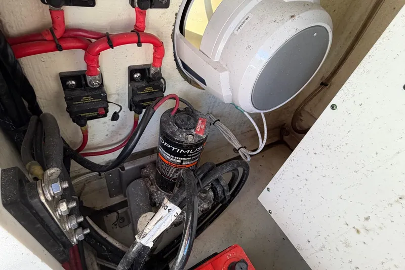 Slide: The Image of 2023 Costa Custom Boats 264 HC electrical and hydraulic system components. - 61