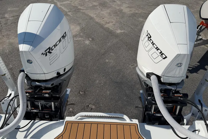 Slide: The Image of Twin Mercury Racing 300 outboard engines on 2023 Costa Custom Boats 264 HC. - 68