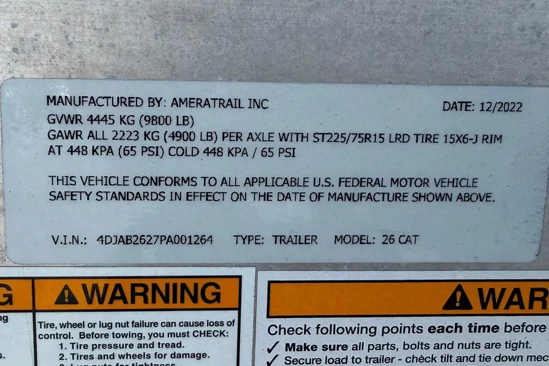 Slide: The Image of Label on Costa Custom Boats 2023 264 HC trailer, detailing specifications and safety standards. - 75