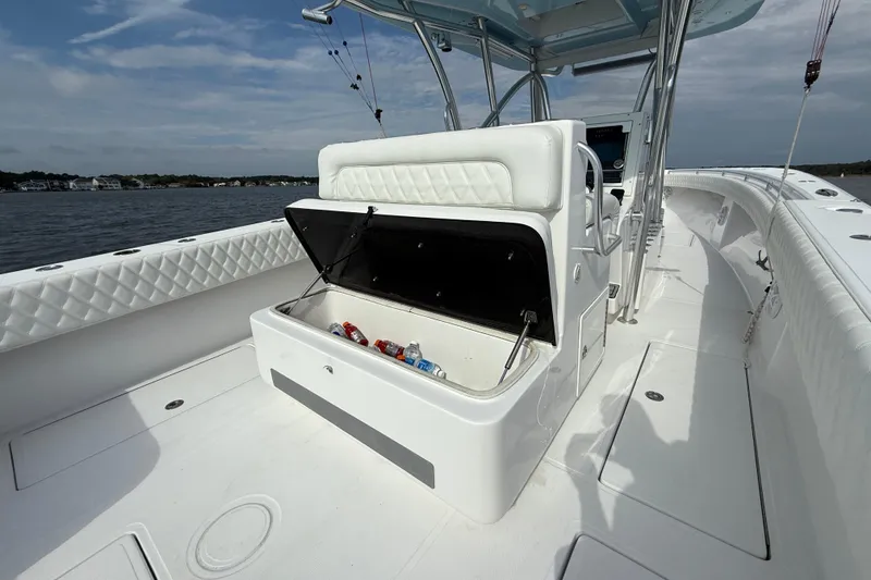 Slide: The Image of 2018 SeaHunter 35 Tournament boat with open storage compartment on deck. - 28