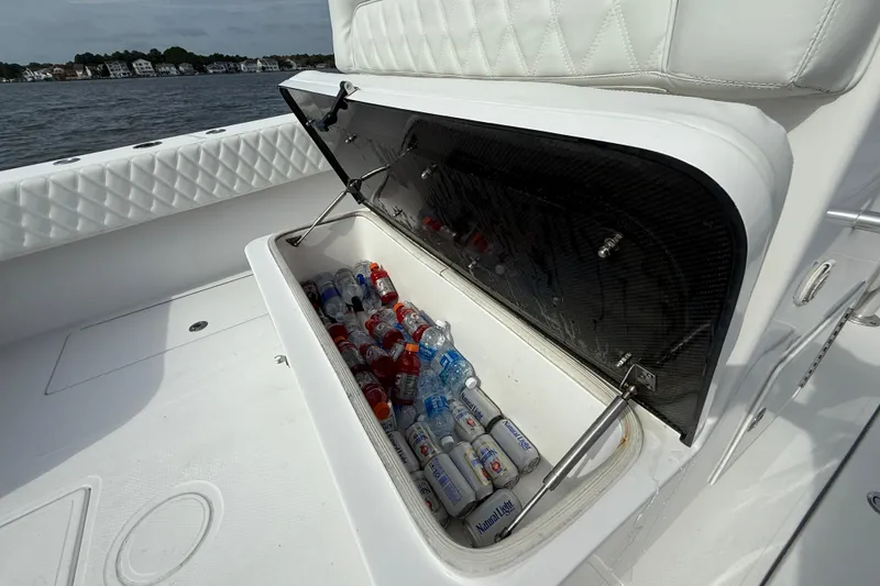 Slide: The Image of 2018 SeaHunter 35 Tournament boat cooler filled with drinks, open on deck. - 29